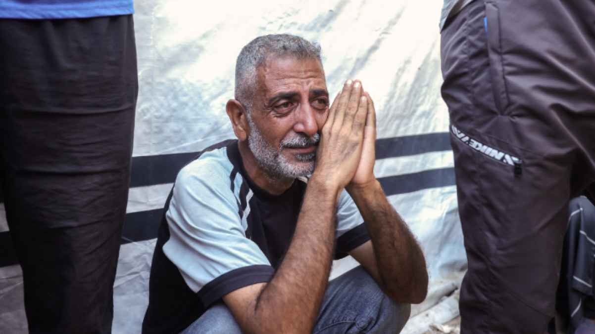 Cry of Pain… A Gazan on the Ruins of His Departed Family
