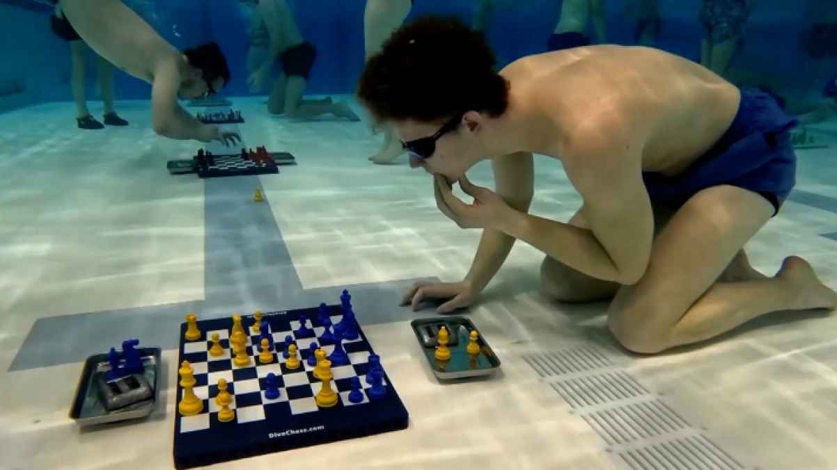 Players compete in underwater chess championship -video