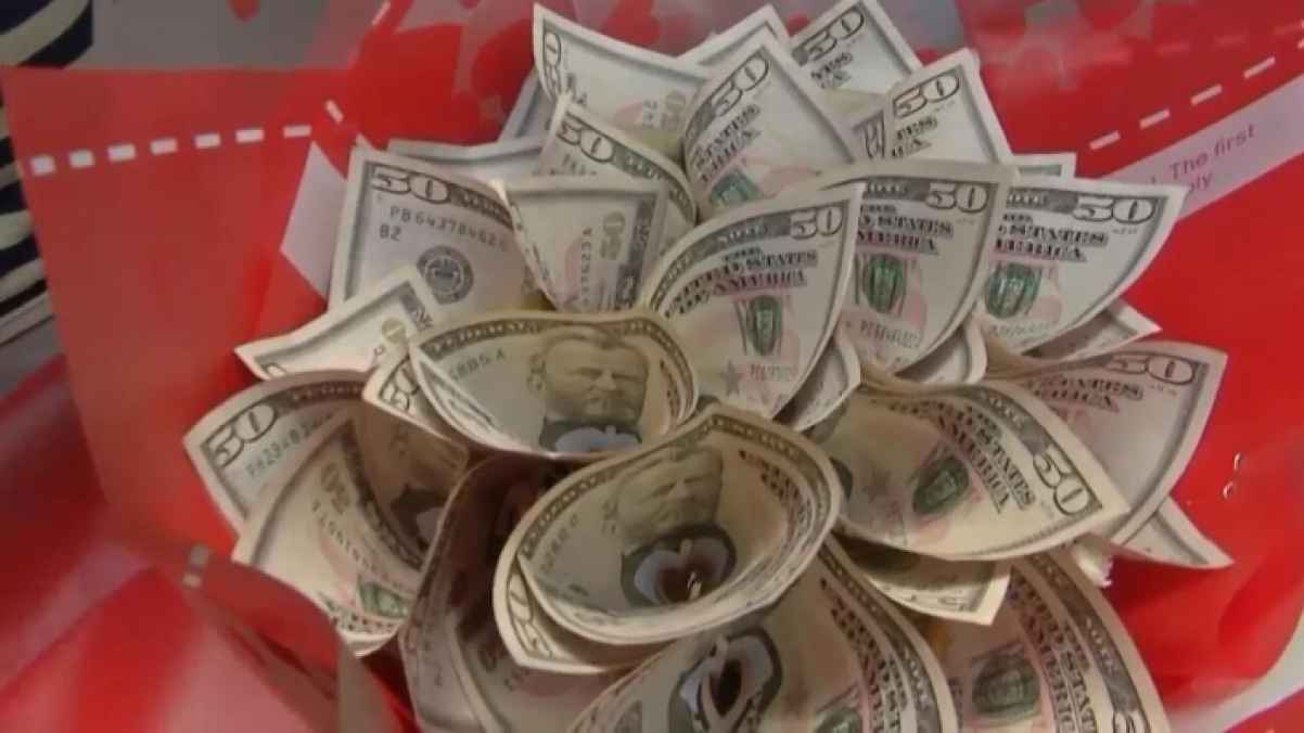 Town swaps flowers for cash bouquets on Valentine’s Day