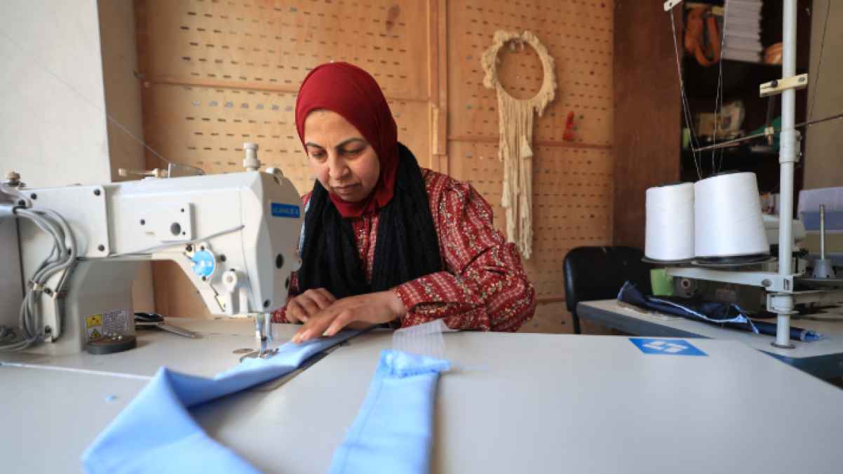 From the Heart of Displacement… A Palestinian Woman Fights the Harshness of War with "Thread and Needle"