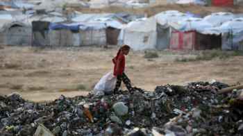 Small Steps on Burning Ashes… A Little Girl Faces Hunger and Deprivation Alone