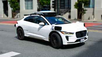 A smart car transports a mother and her newborn to the hospital after giving birth in the back seat